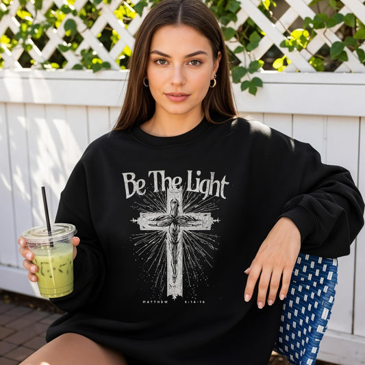 Christian Women’s Sweatshirt – Be the Light Crewneck with Cross – Faith Inspired Religious Gift – Scripture Apparel for Her