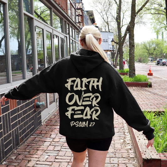 May include: Black hooded sweatshirt with the text "Faith Over Fear Psalm 27" in a cream color on the back.